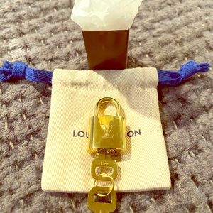 New Guaranteed Authentic Louis Vuitton Brass Lock